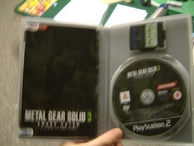 Inside the box (No free memory card, just wanted to show the slot being put to good use- for my MGS3 memory card, no less)